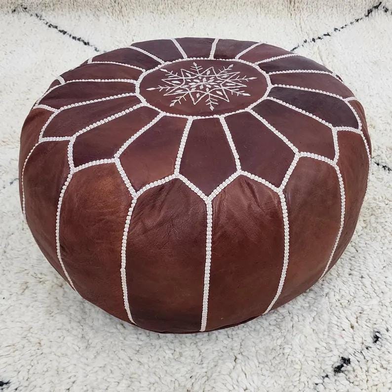 Moroccan Leather Pouf — paired with neutral home decor