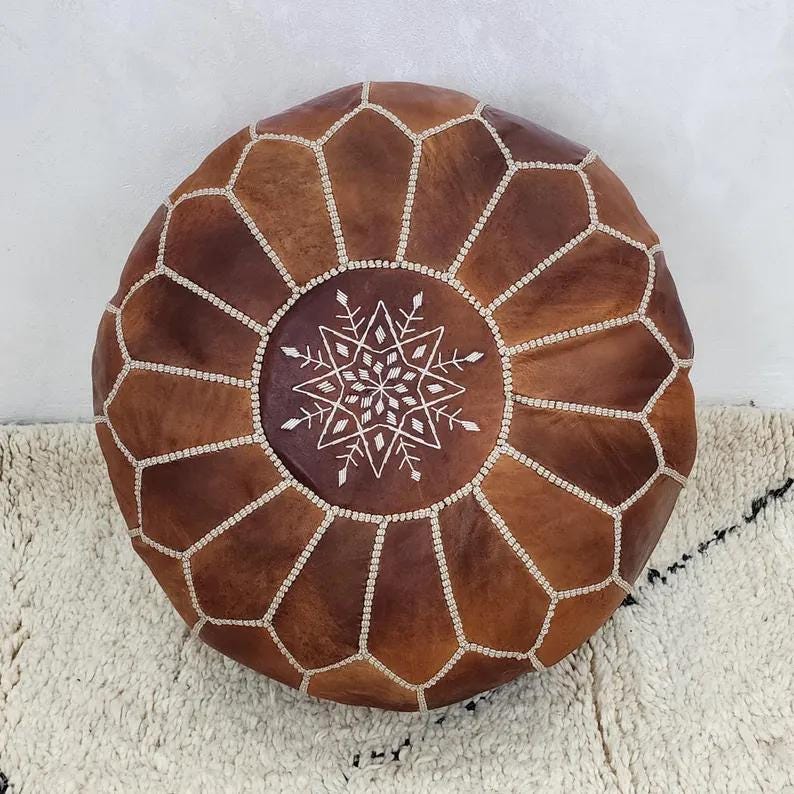 Moroccan Leather Pouf — color variation in natural light