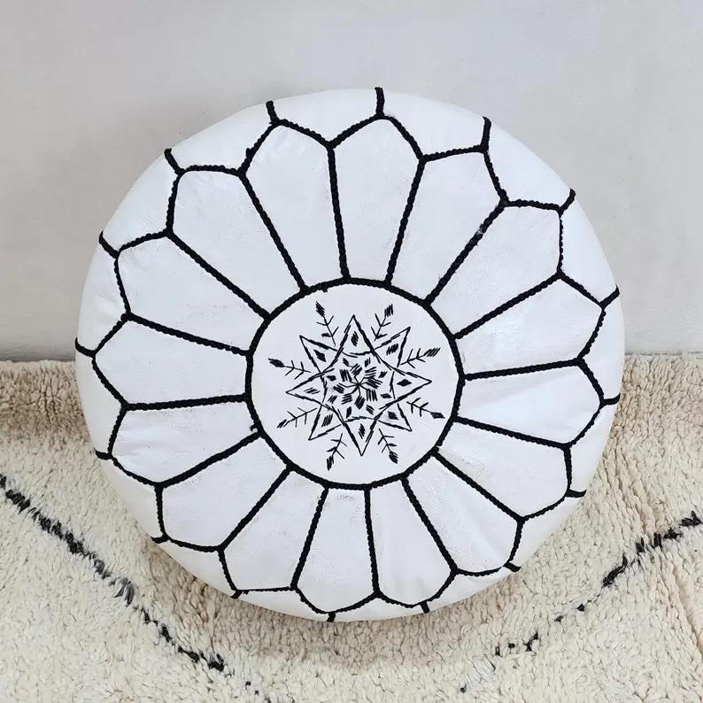 Moroccan Leather Pouf — featured in a minimalist setting