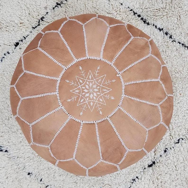 Moroccan Leather Pouf — styled in a modern boho living room