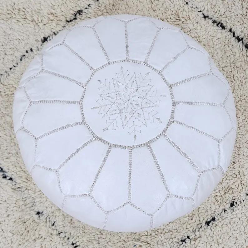 Moroccan Leather Pouf — three-quarter angle