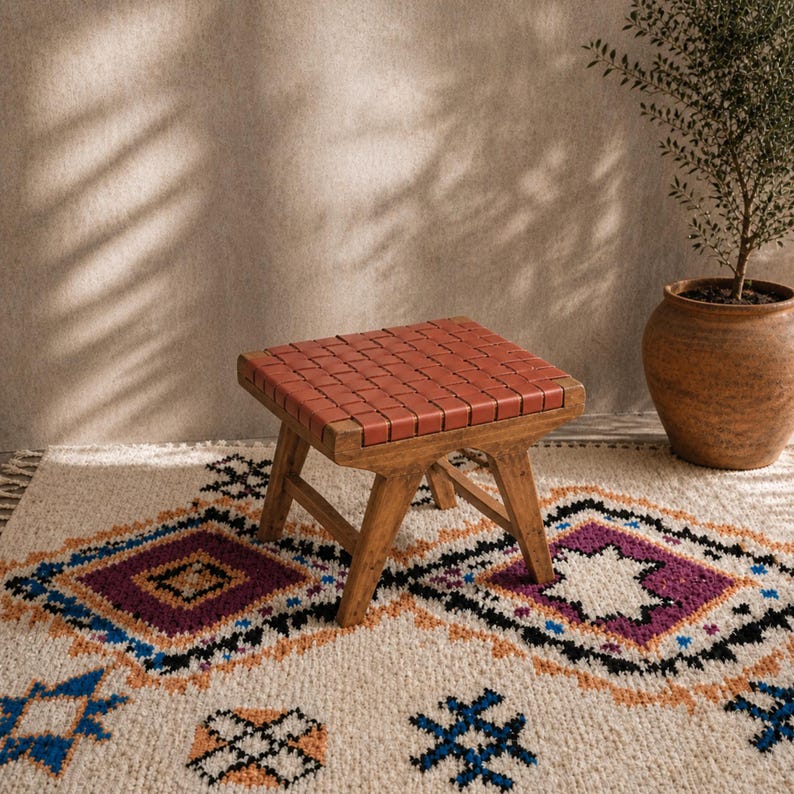 Moroccan Foot Stool — side view of artisan stitching