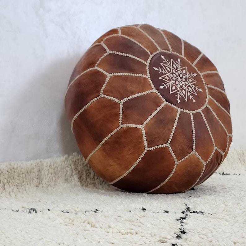 Moroccan Leather Pouf — styled in a modern boho living room