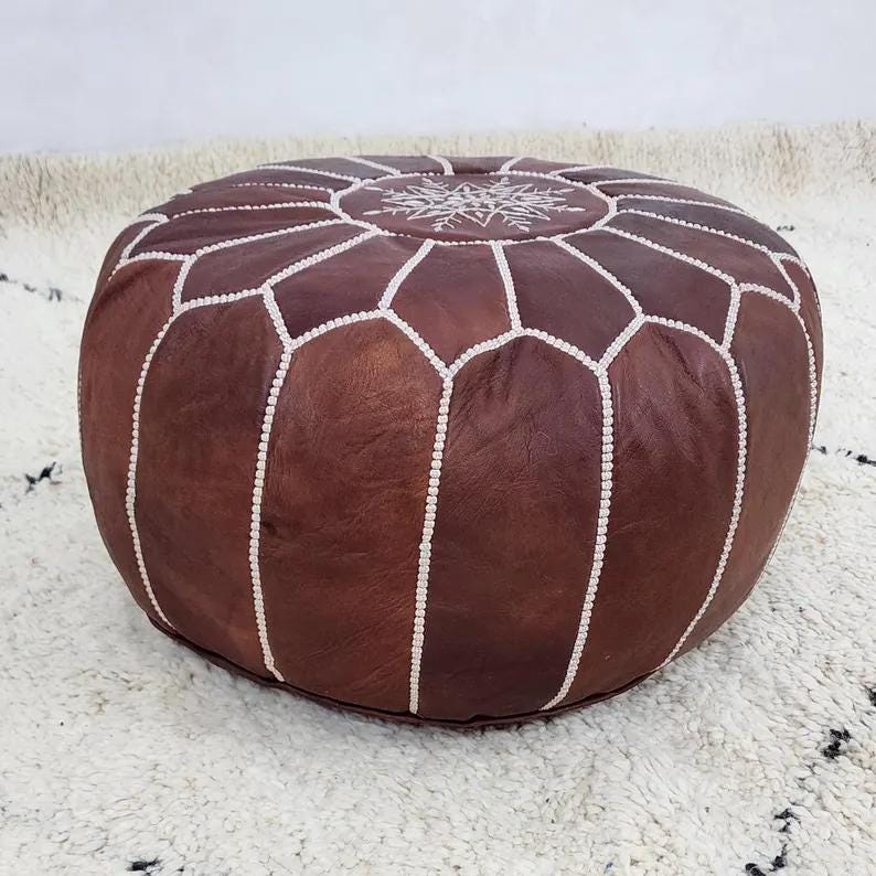 Moroccan Leather Pouf — styled in a modern boho living room