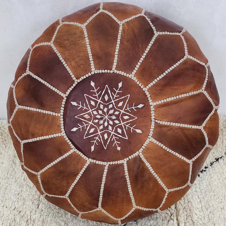Moroccan Leather Pouf — color variation in natural light