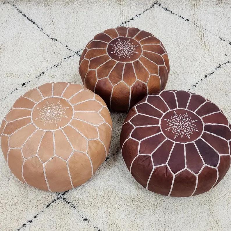 Moroccan Leather Pouf — color variation in natural light