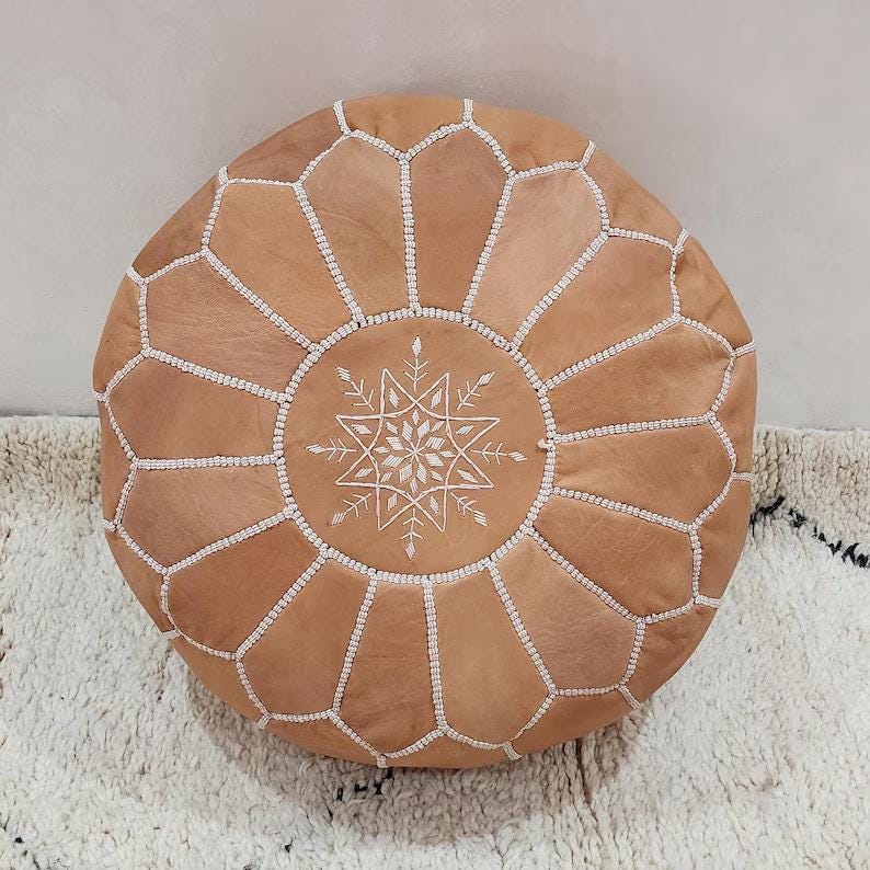 Moroccan Leather Pouf — paired with neutral home decor