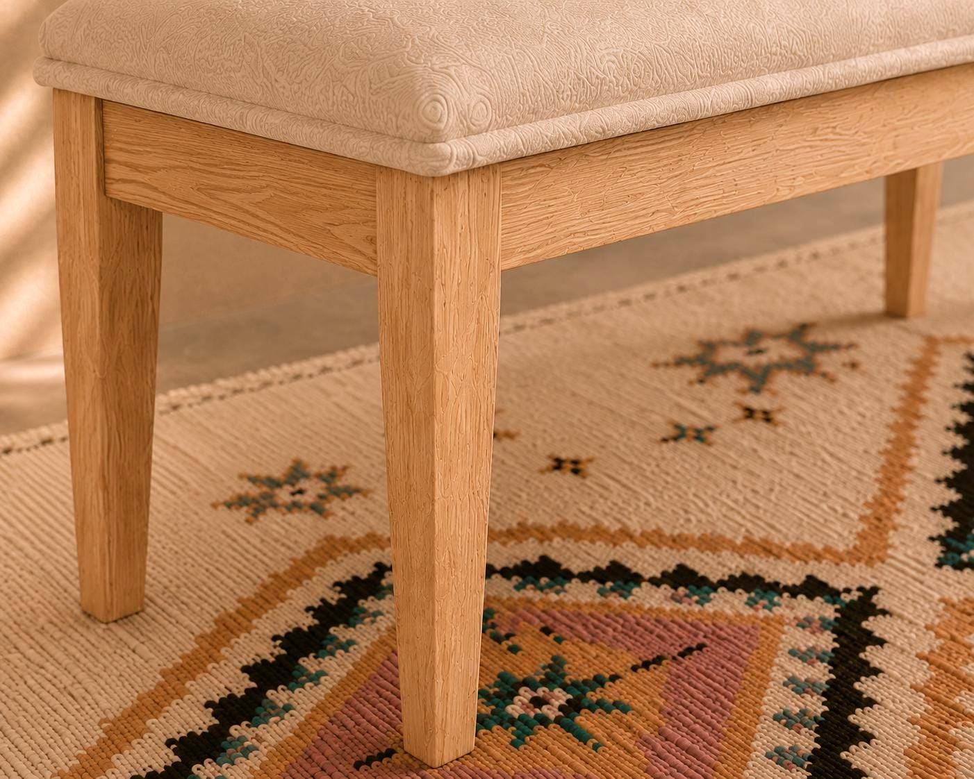 Moroccan Fabric Bench — side view of artisan stitching