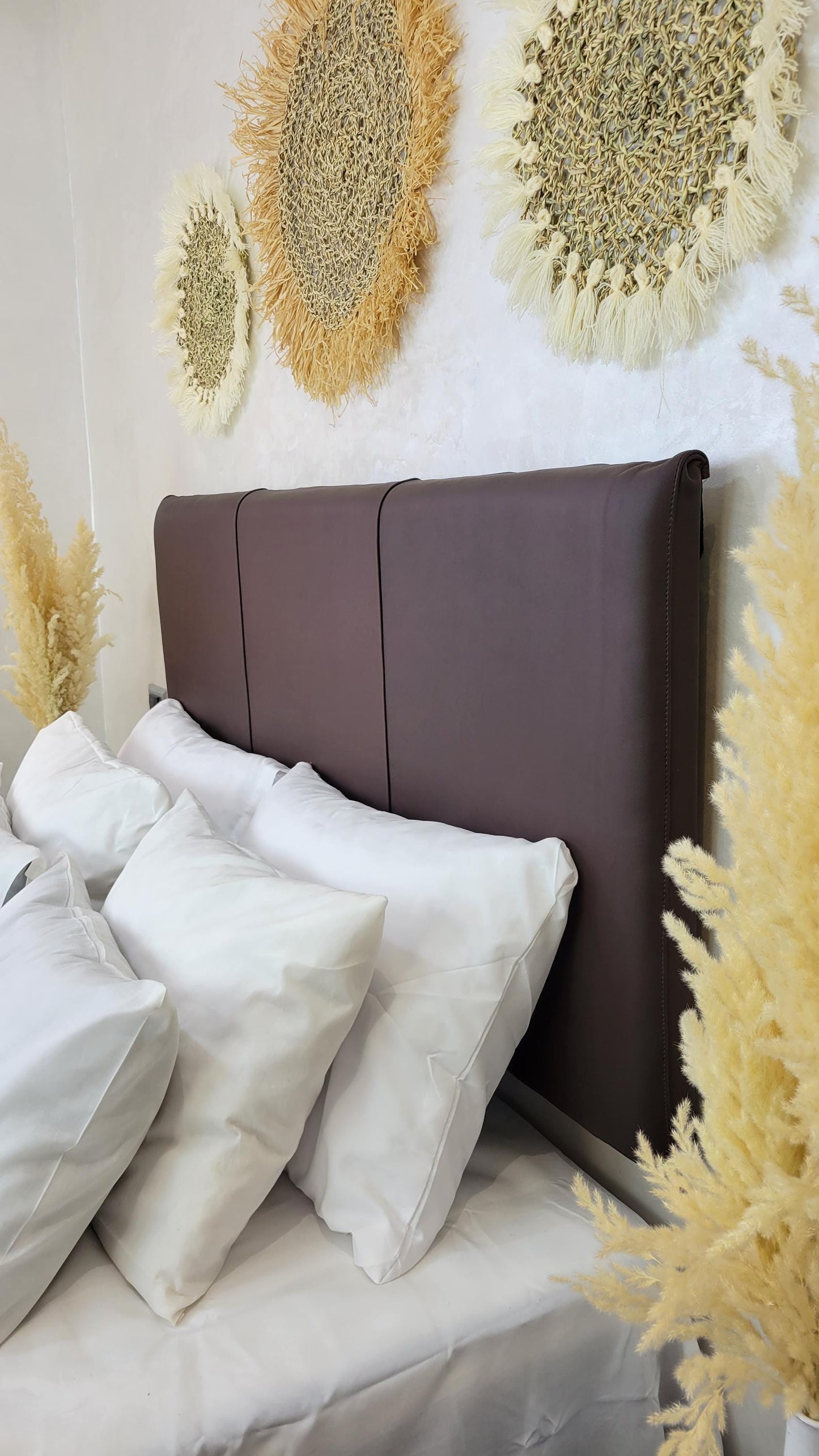 Upholstered Leather Headboard — styled in a modern boho living room