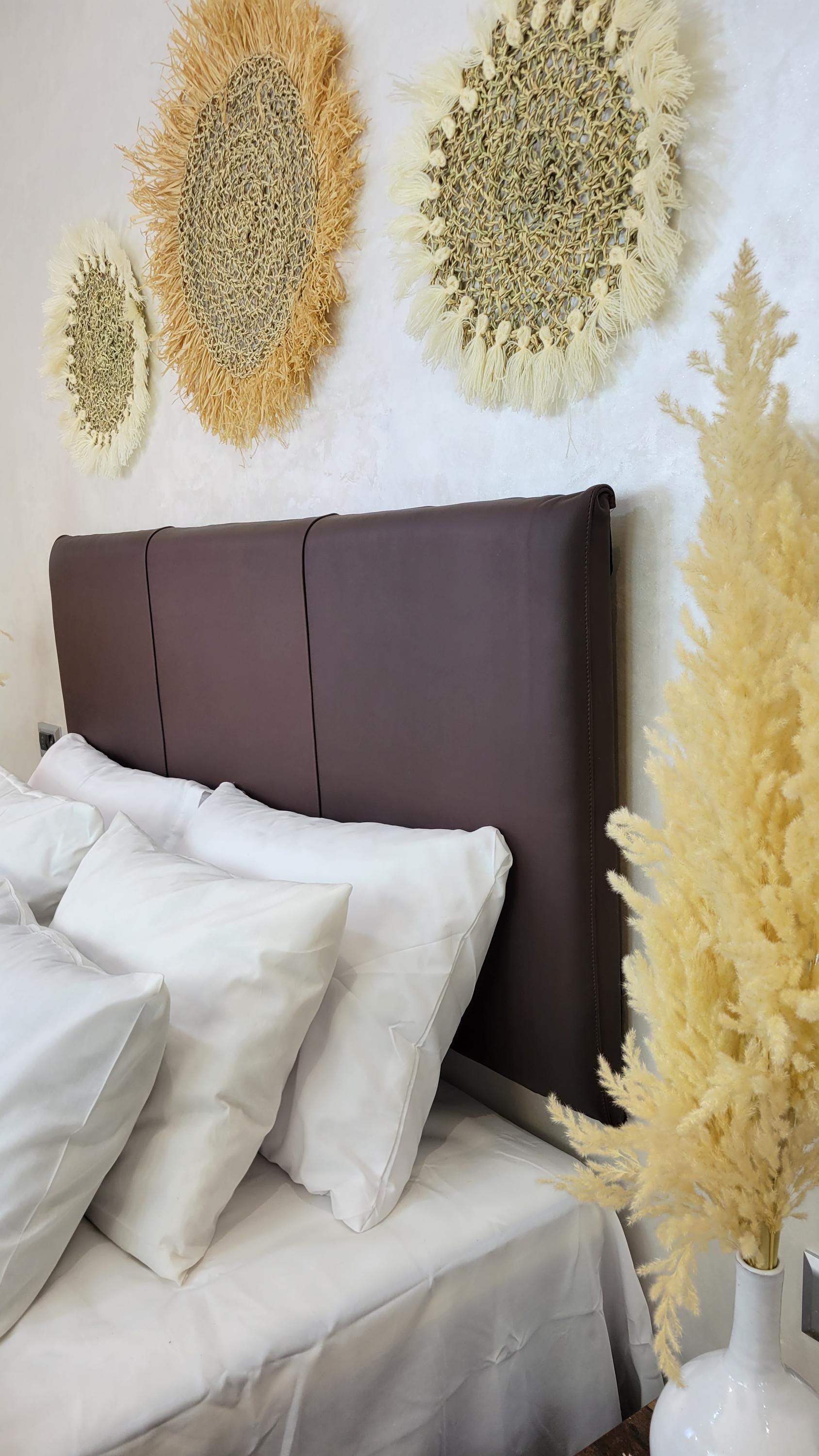 Upholstered Leather Headboard — paired with neutral home decor