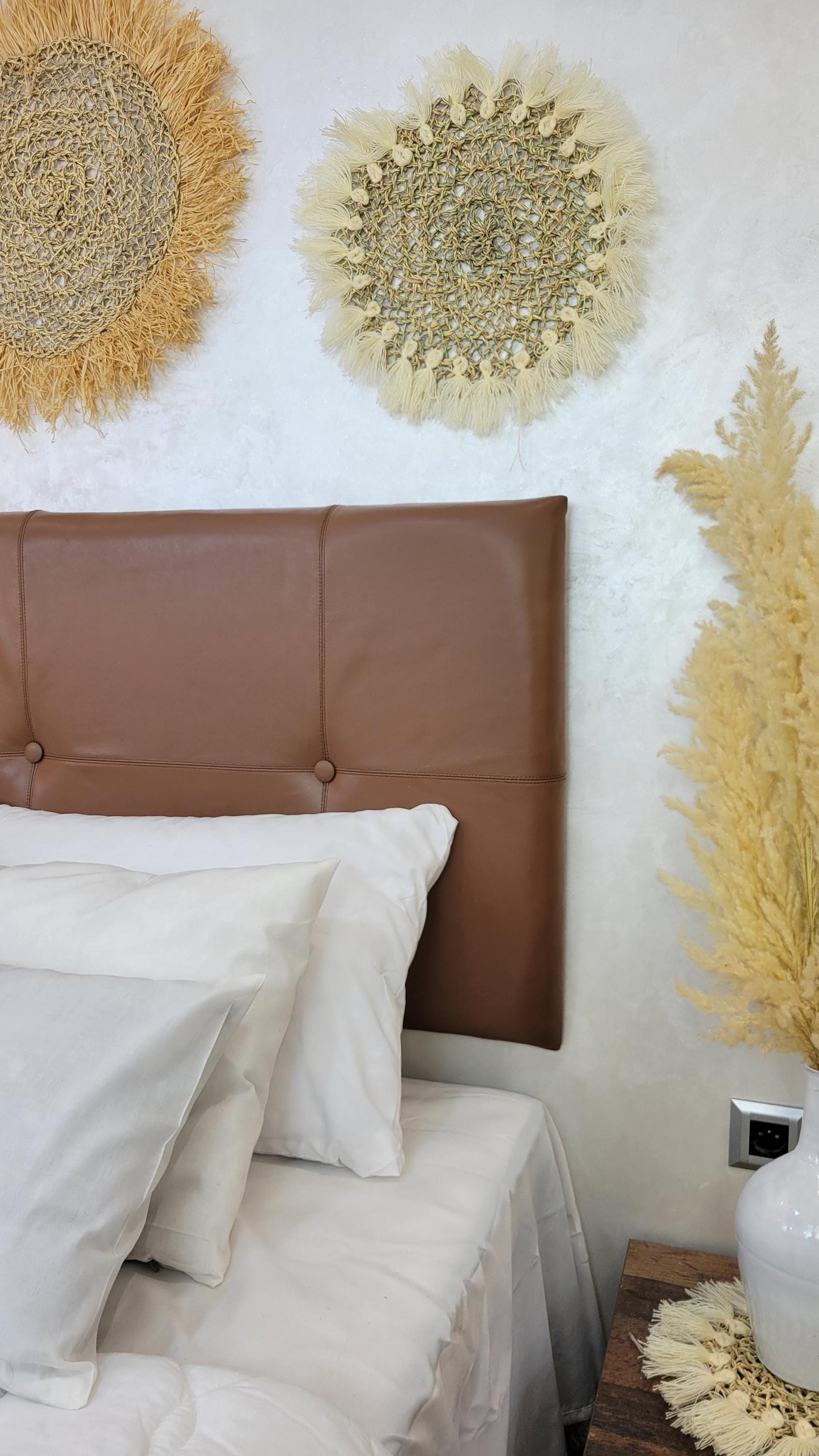 Upholstered Leather Headboard — color variation in natural light