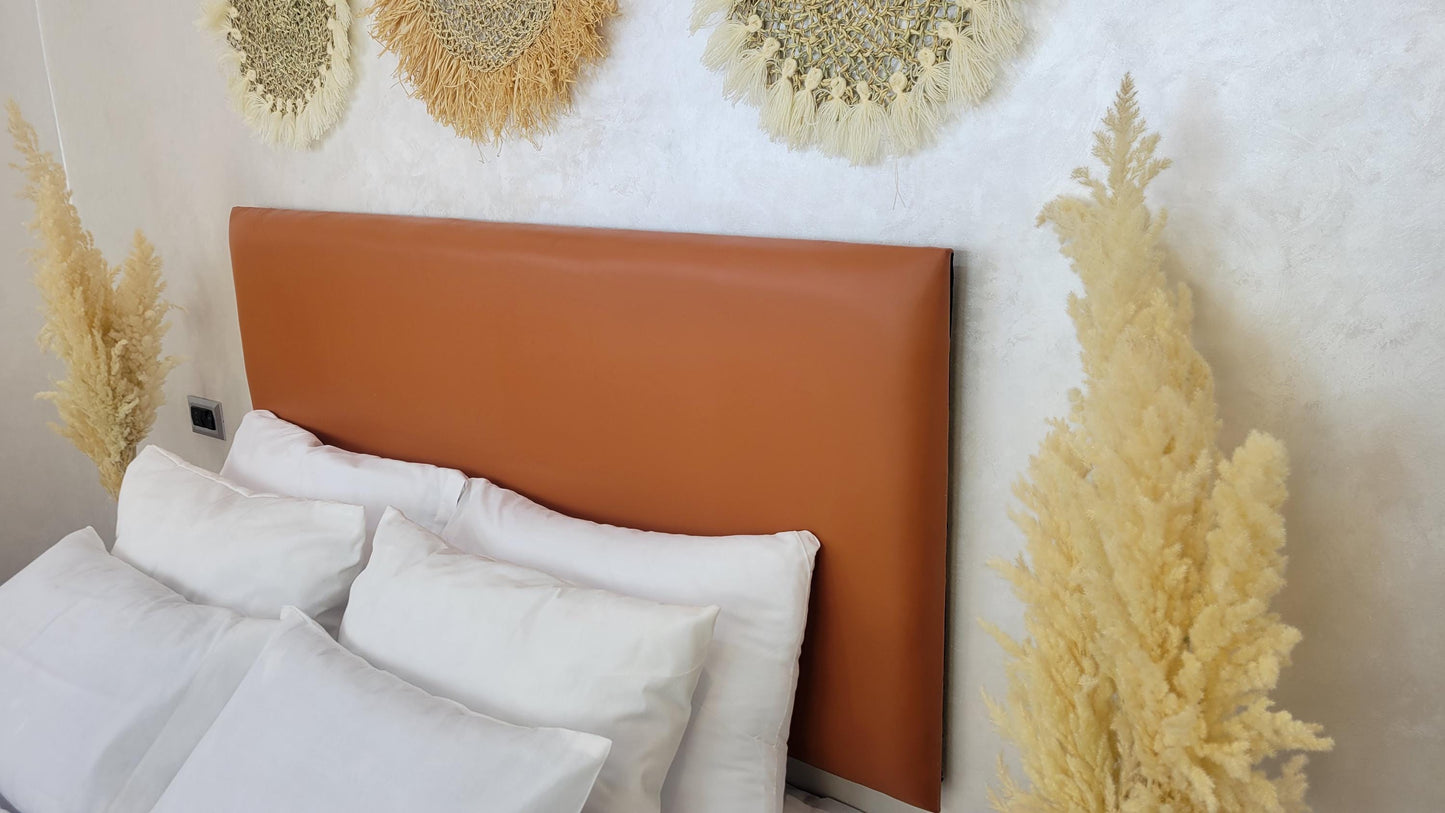Upholstered Leather Headboard — lifestyle scene in a US home