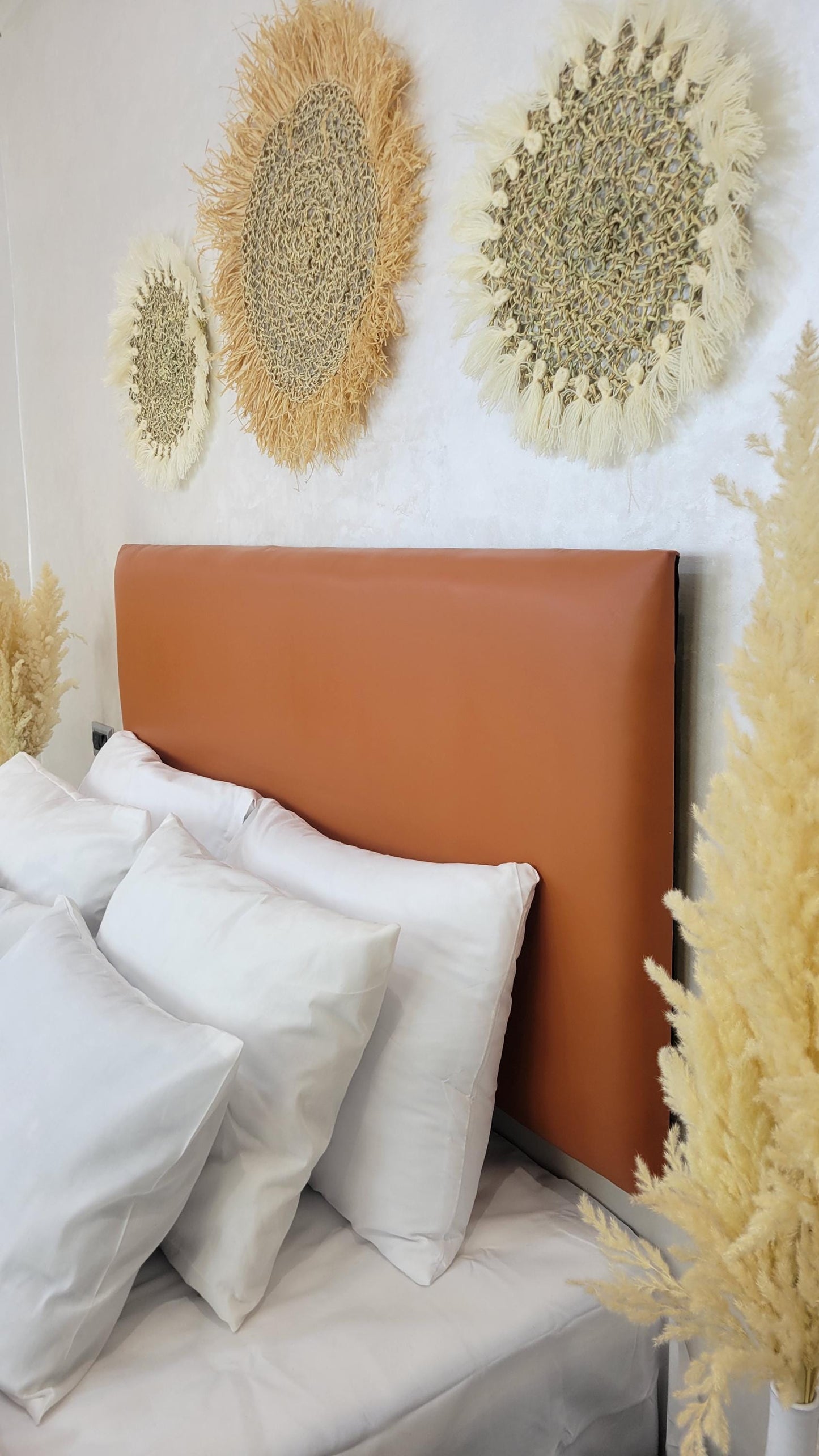 Upholstered Leather Headboard — color variation in natural light