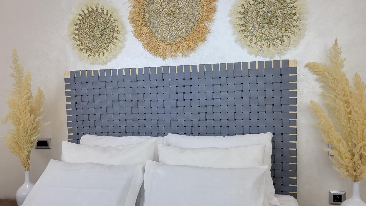 Leather Headboard with Legs — side view of artisan stitching