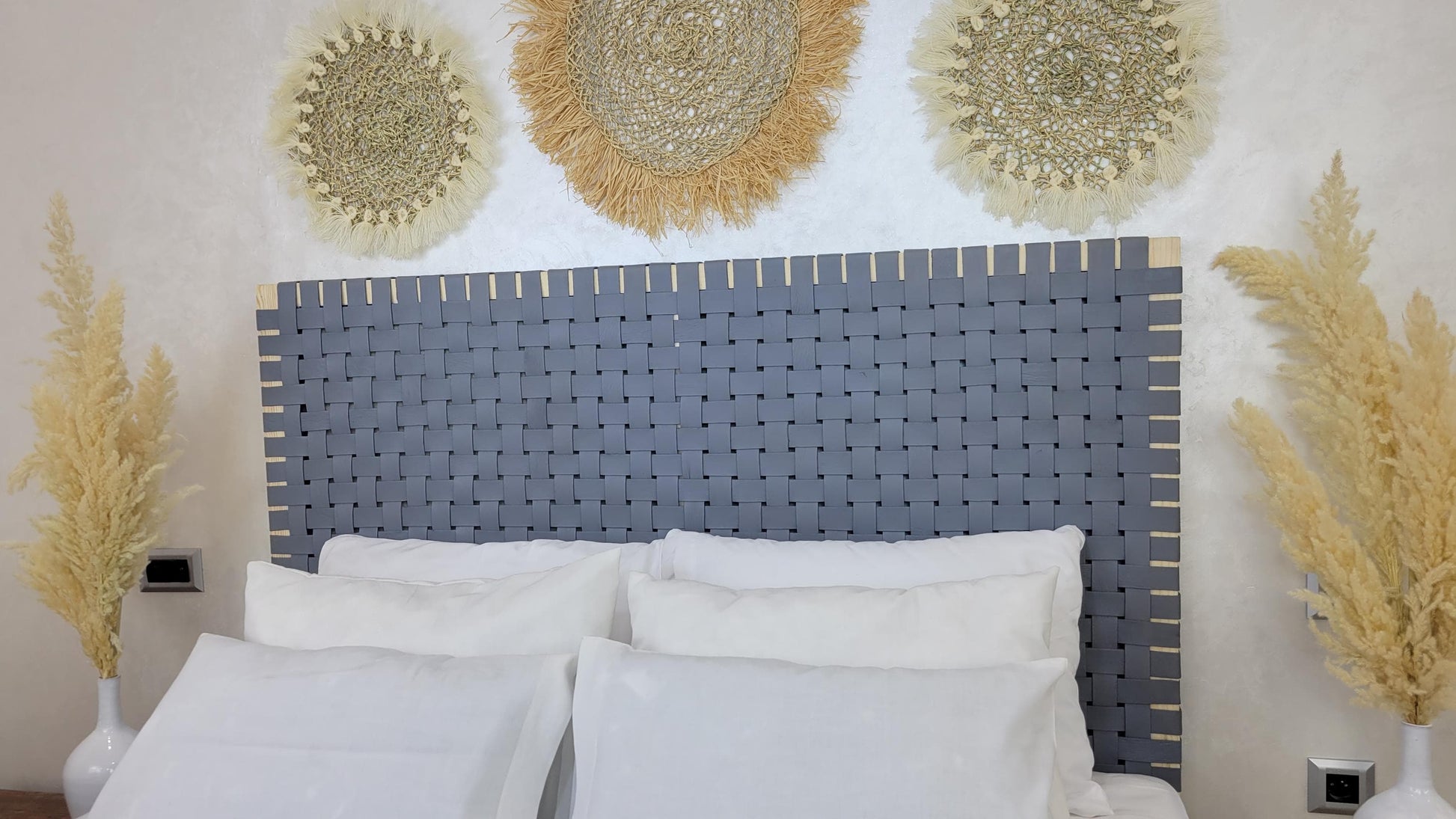 Leather Headboard with Legs — side view of artisan stitching