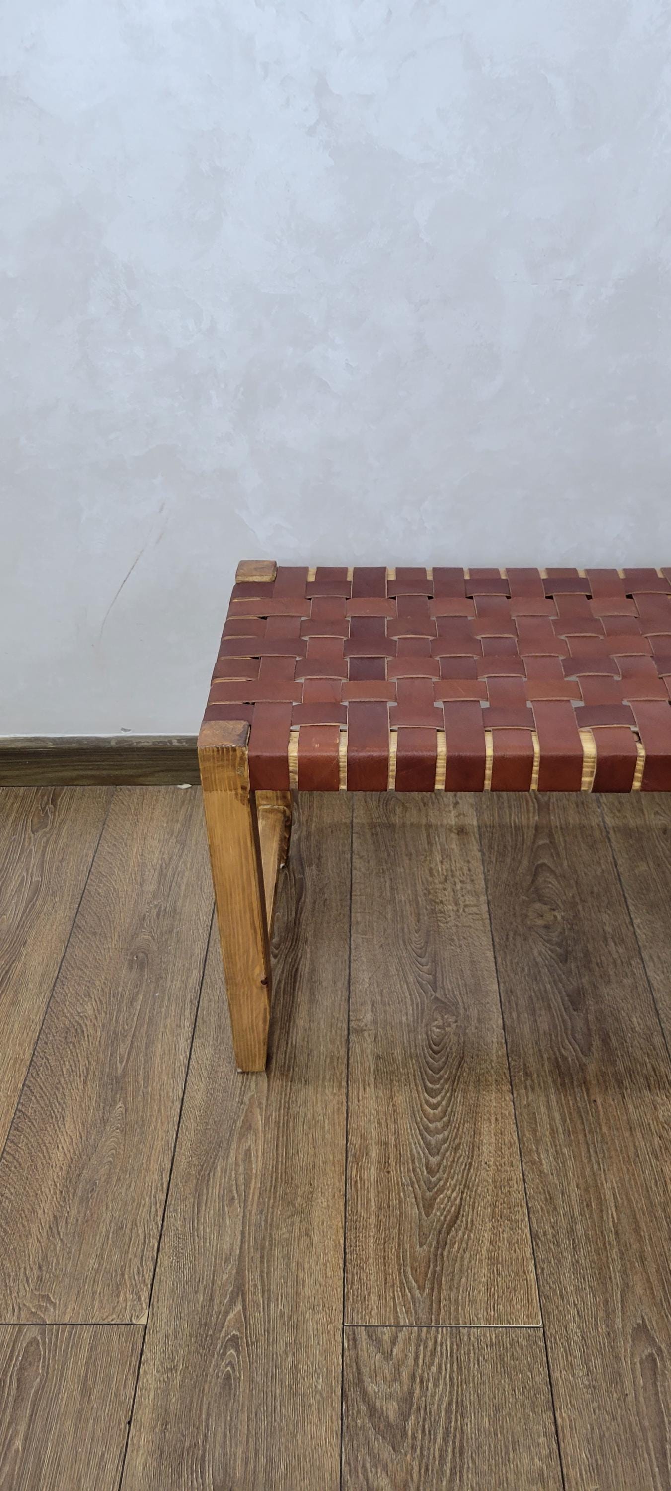 Woven Leather Bench — color variation in natural light