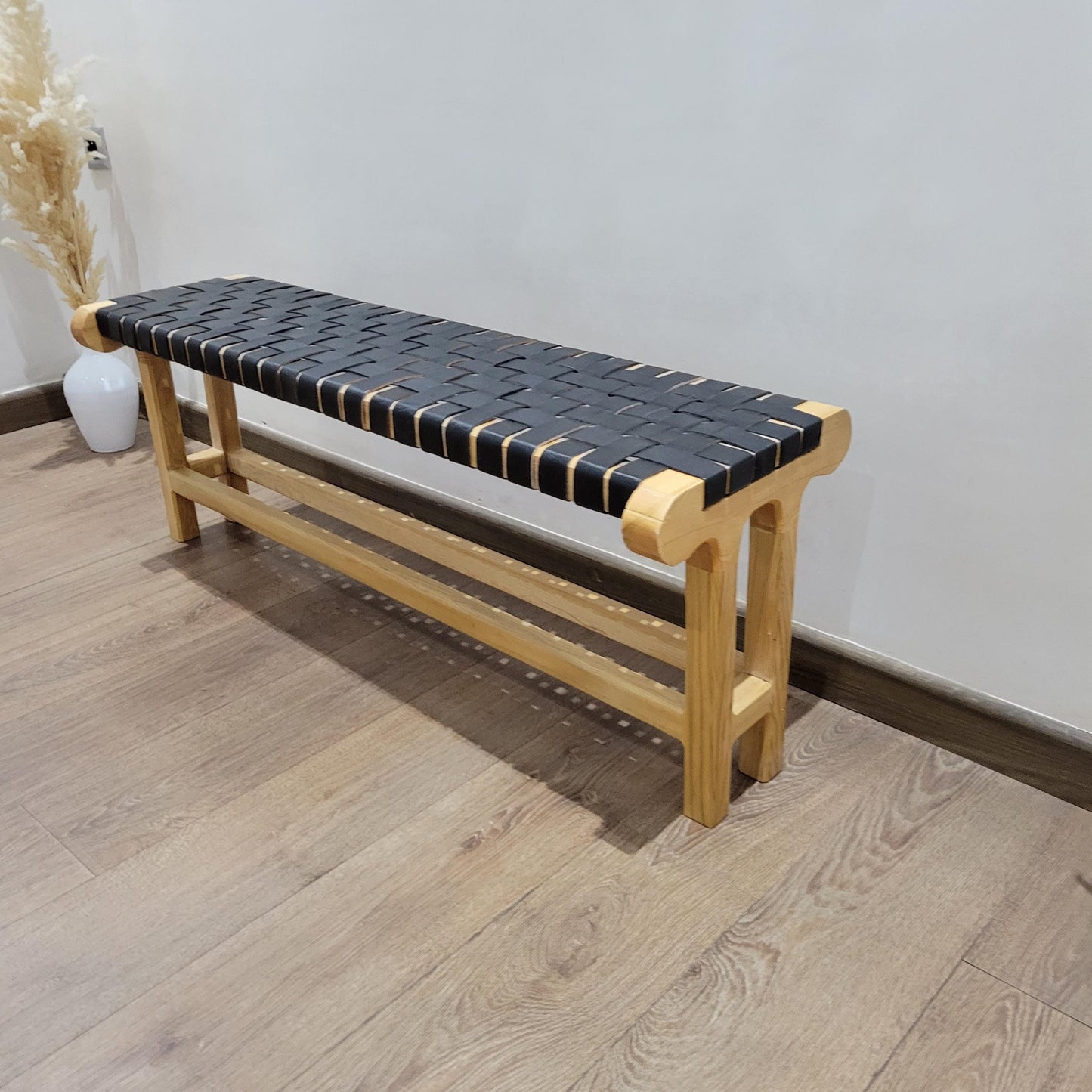 Woven Leather Bench — styled in a modern boho living room