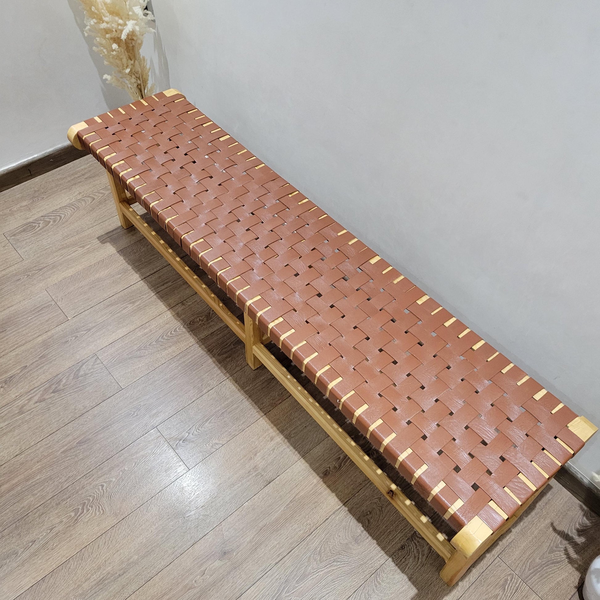 Woven Leather Bench — paired with neutral home decor