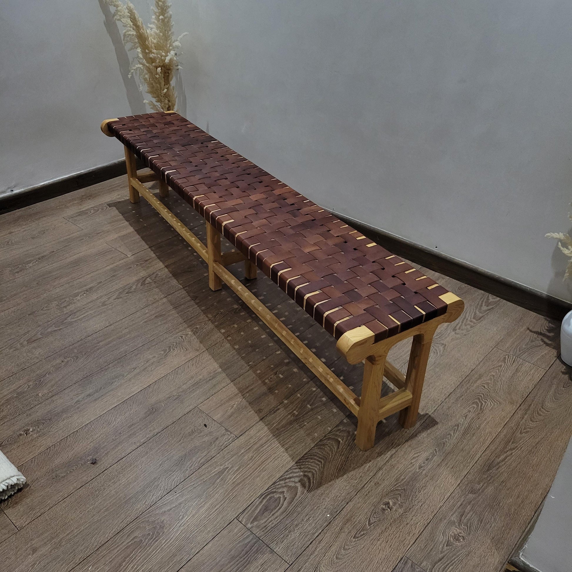 Woven Leather Bench — paired with neutral home decor