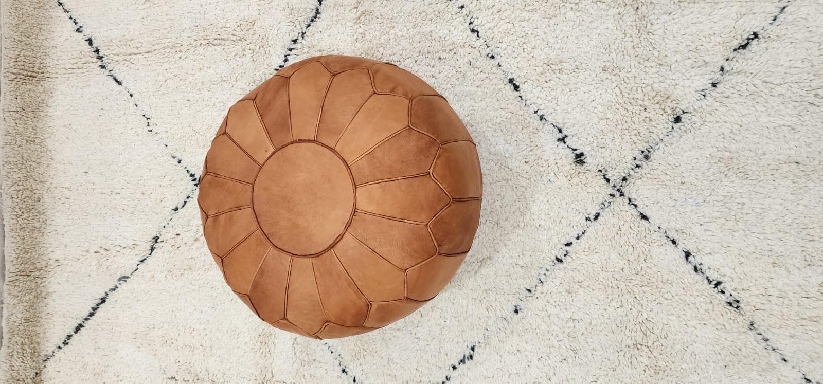 Moroccan Floor Pouf — side view of artisan stitching