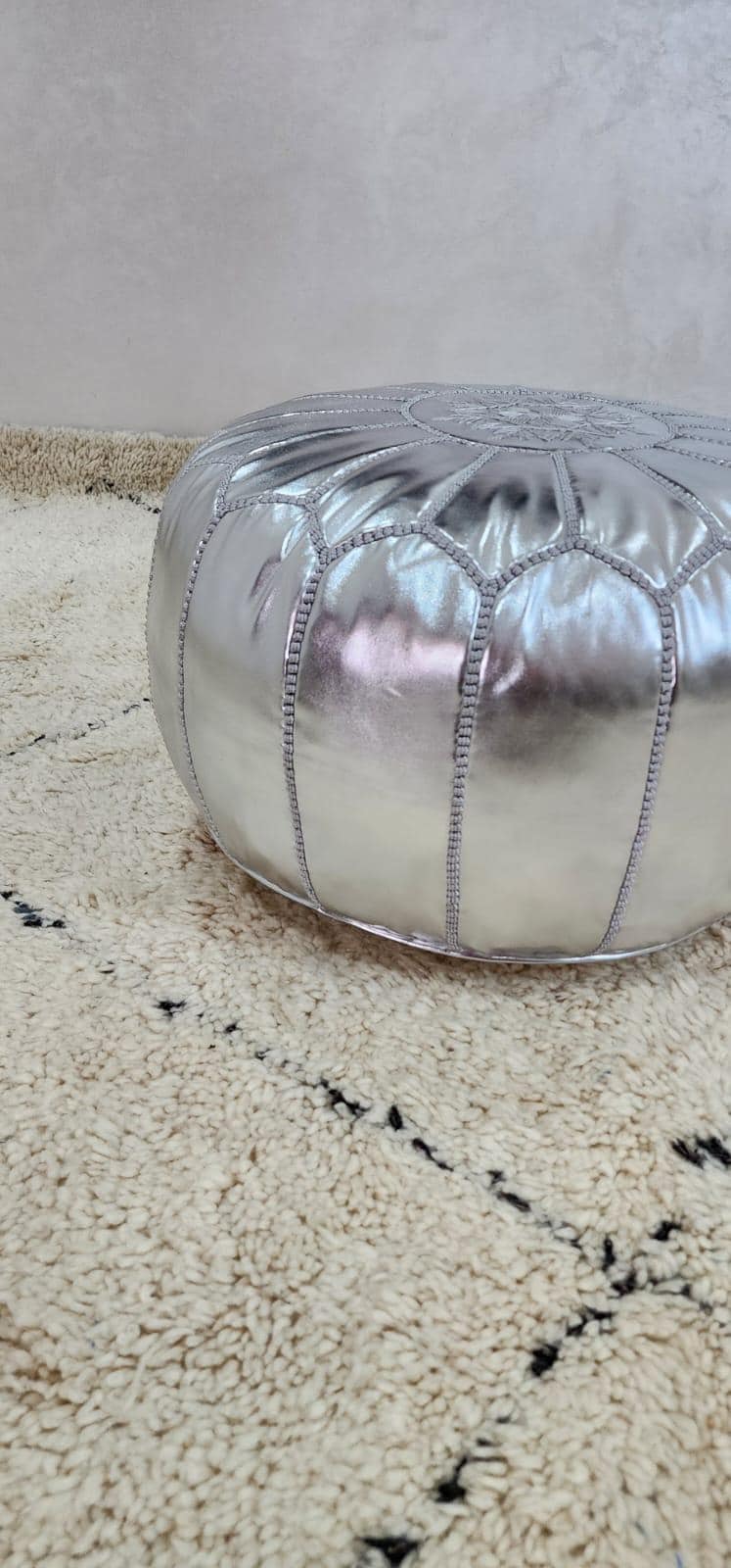 Knit Pouf Ottoman — top view showing weave pattern