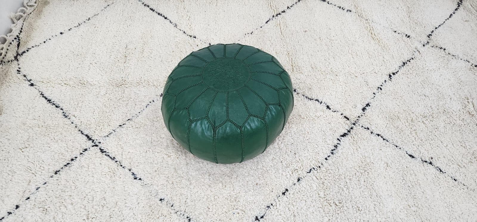 Moroccan Leather Pouf — side view of artisan stitching