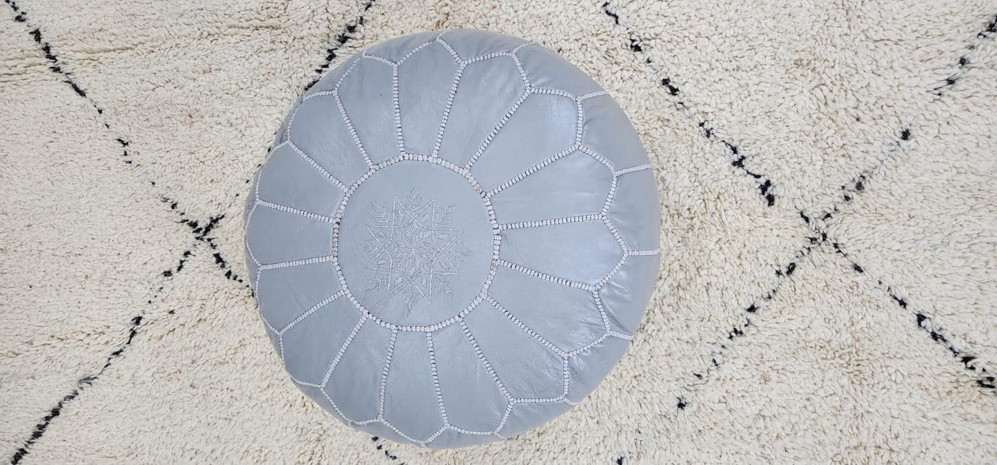 Moroccan Leather Pouf — color variation in natural light