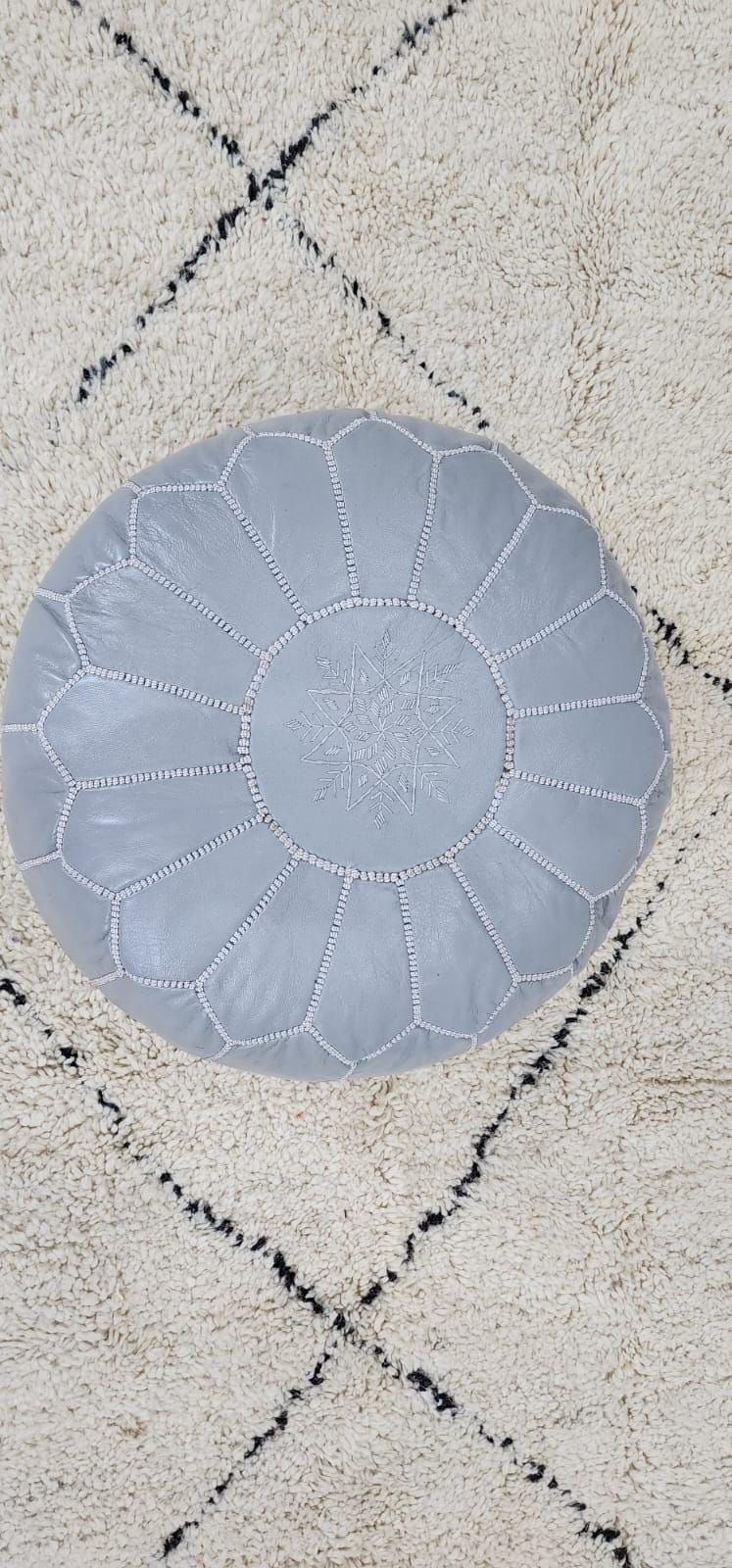 Moroccan Leather Pouf — three-quarter angle