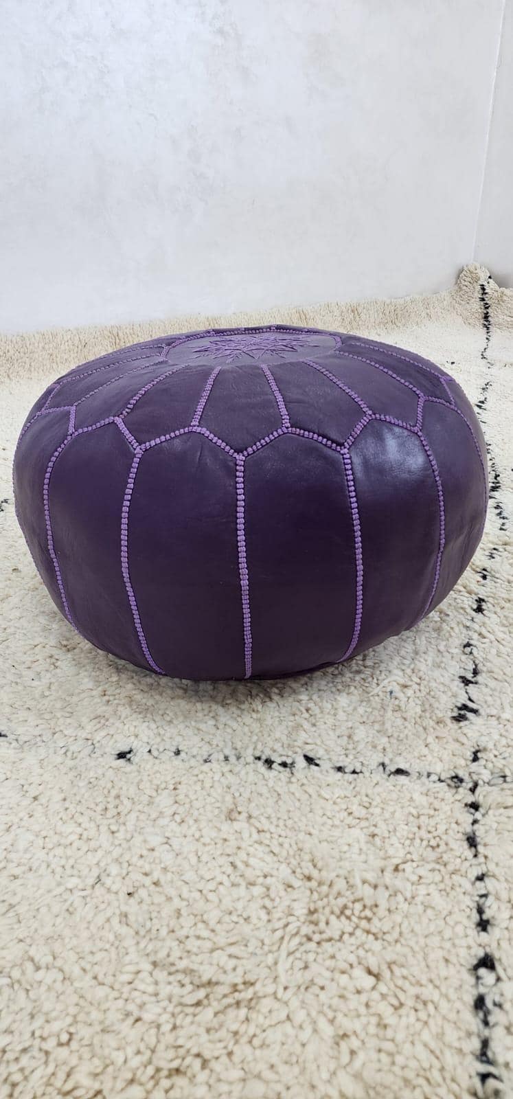 Moroccan Leather Pouf — three-quarter angle