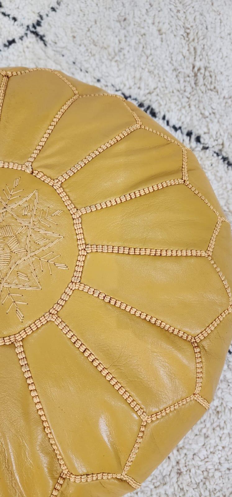 Moroccan Leather Pouf — three-quarter angle