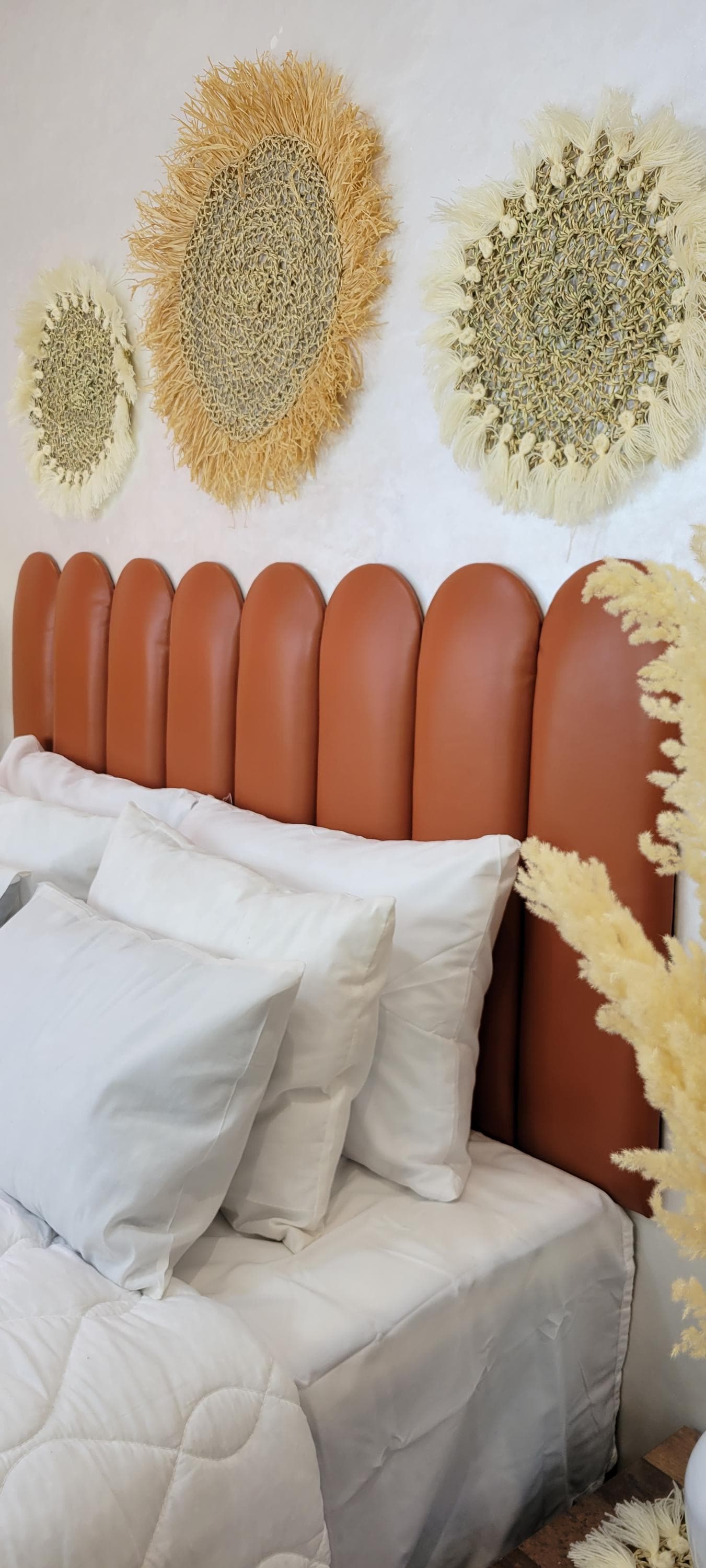 Upholstered Leather Headboard — styled in a modern boho living room