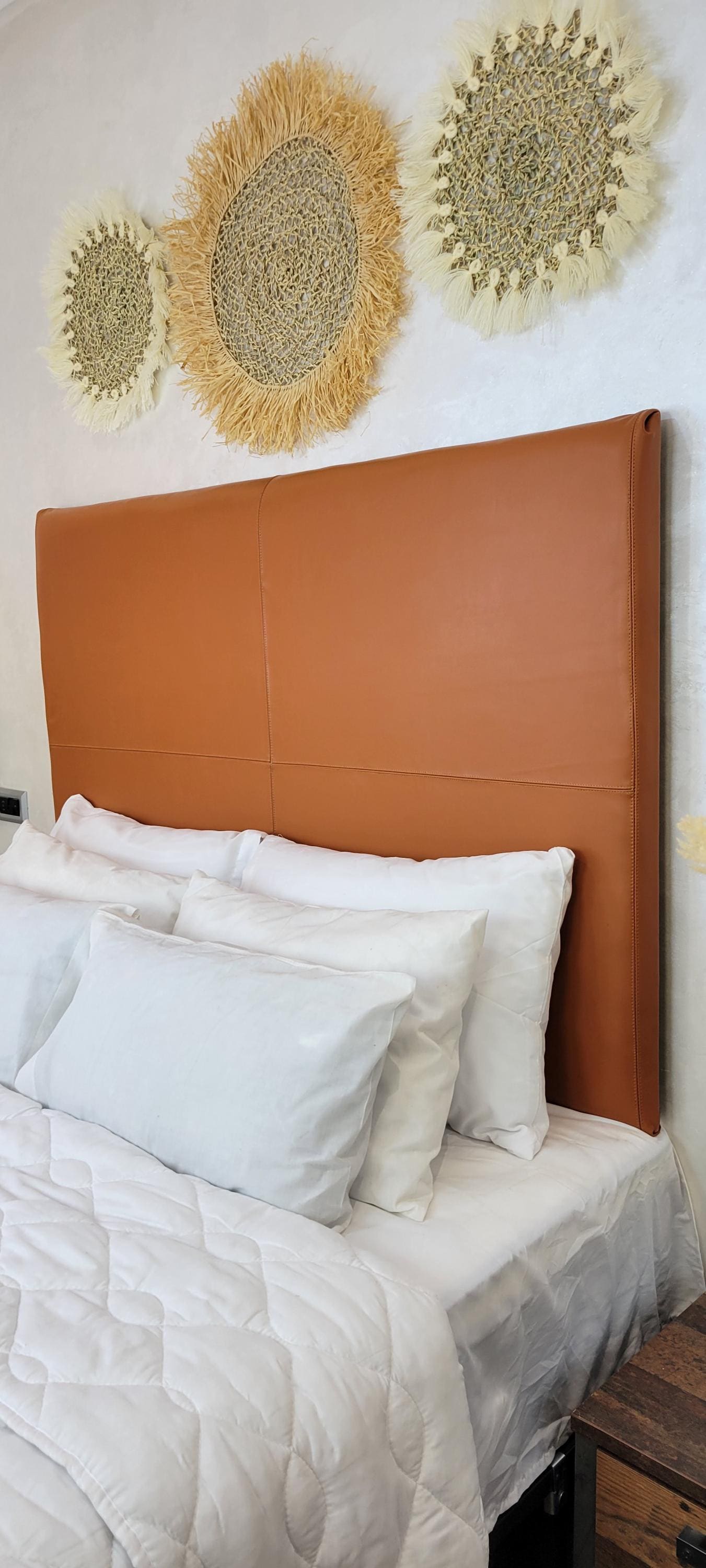 Upholstered Leather Headboard — paired with neutral home decor