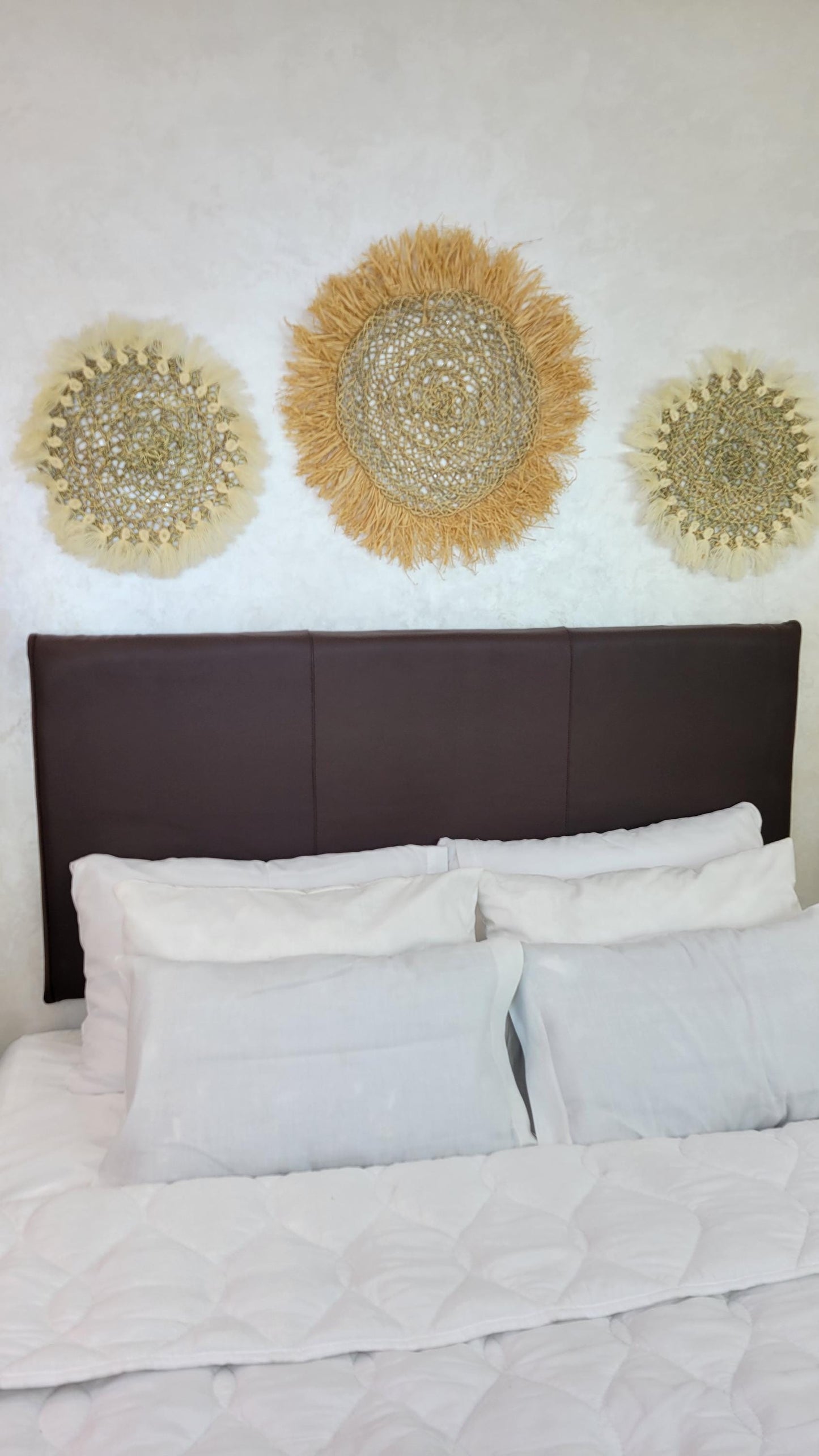 Upholstered Leather Headboard — color variation in natural light