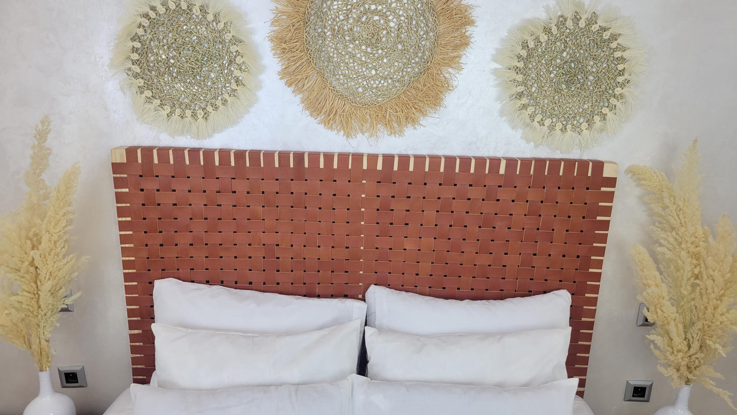 Leather Headboard with Legs — side view of artisan stitching