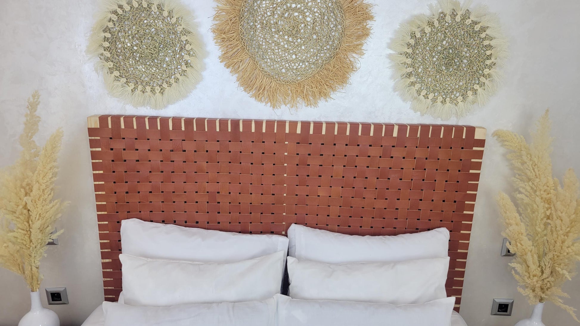 Leather Headboard with Legs — side view of artisan stitching