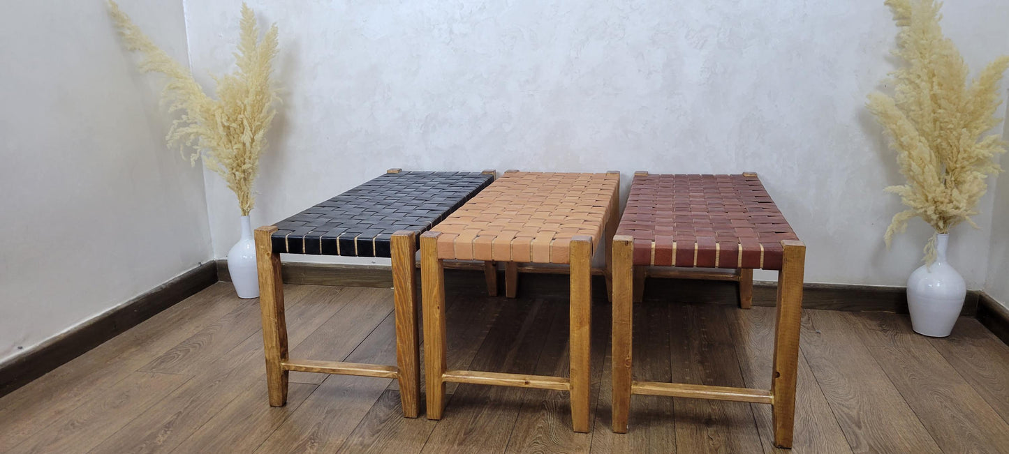 Woven Leather Bench — side view of artisan stitching