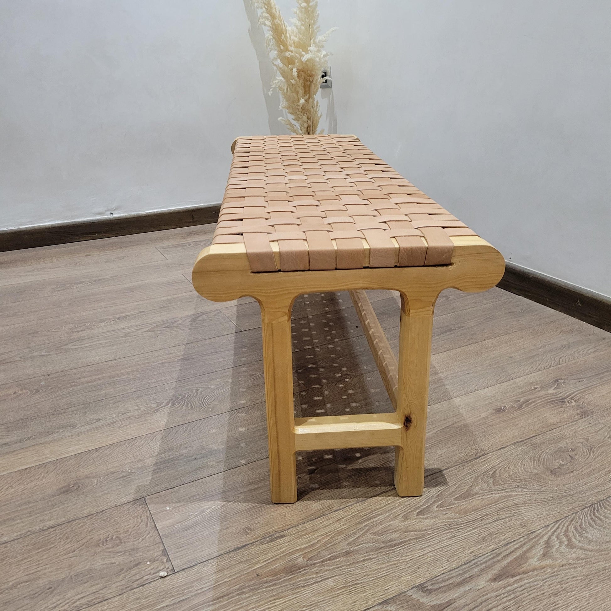 Woven Leather Bench — paired with neutral home decor