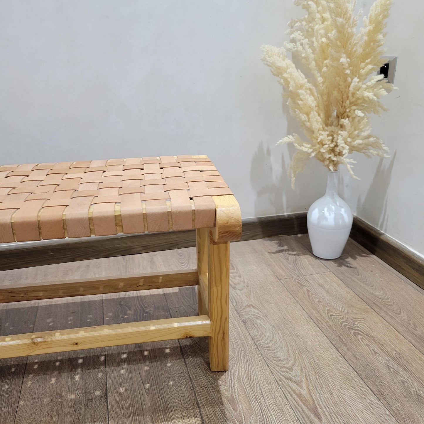 Woven Leather Bench — color variation in natural light