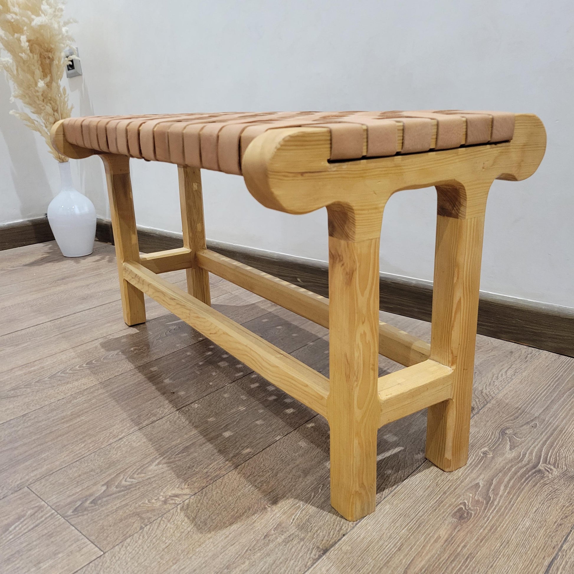 Woven Leather Bench — paired with neutral home decor
