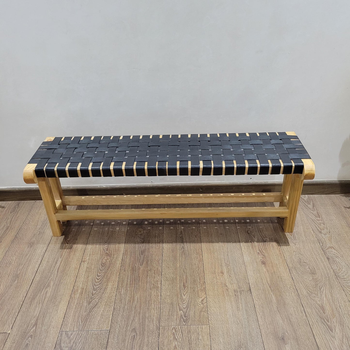 Woven Leather Bench — alternate angle showing scale