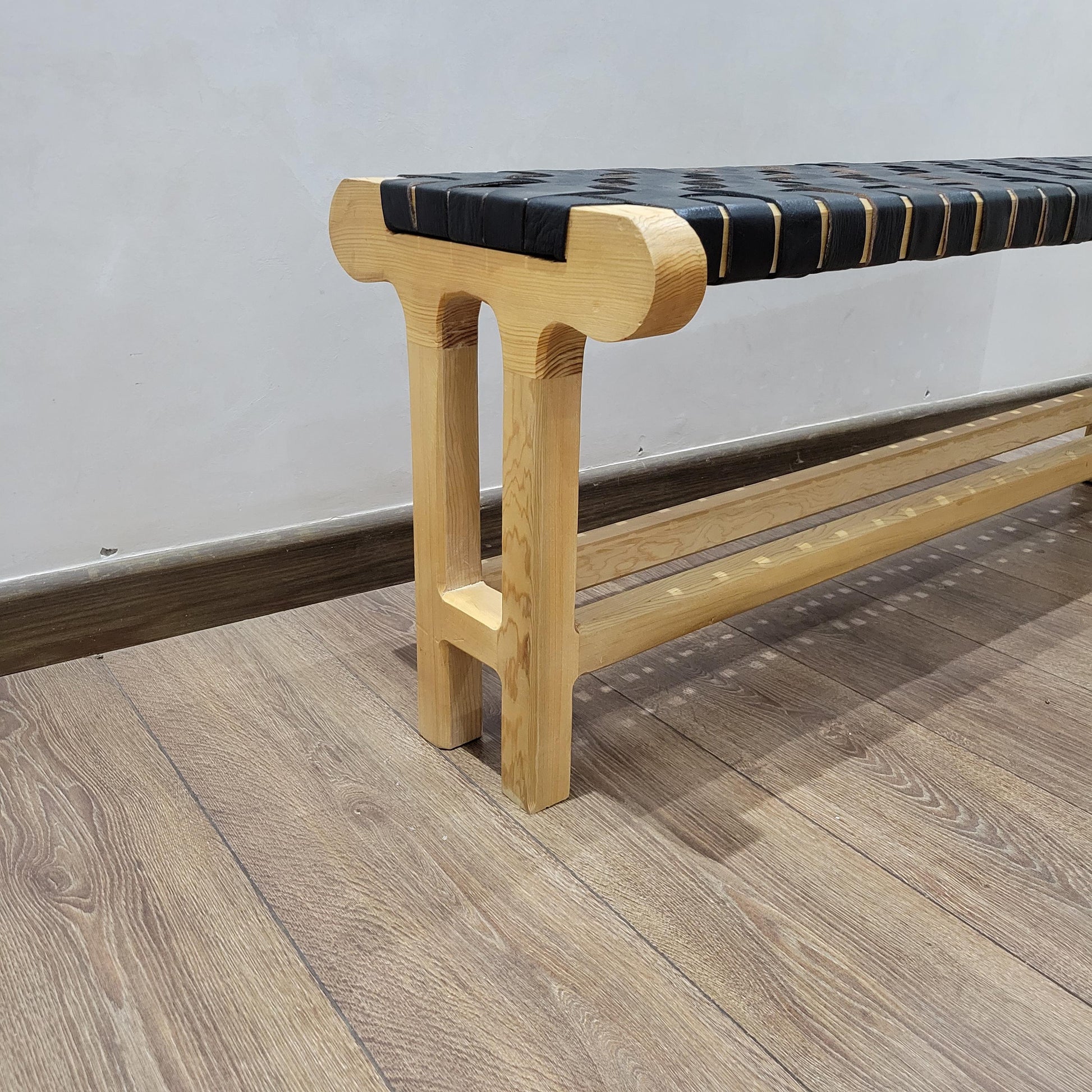 Woven Leather Bench — paired with neutral home decor