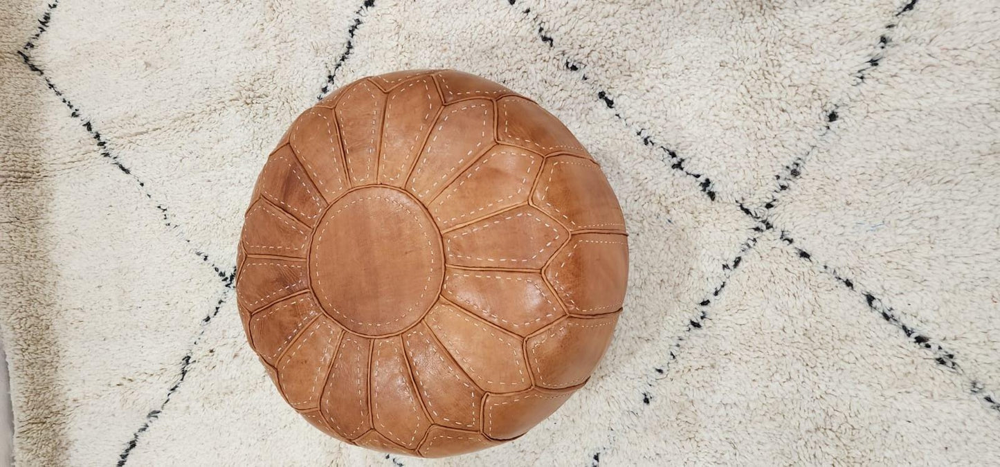 Moroccan Leather Pouf — paired with neutral home decor