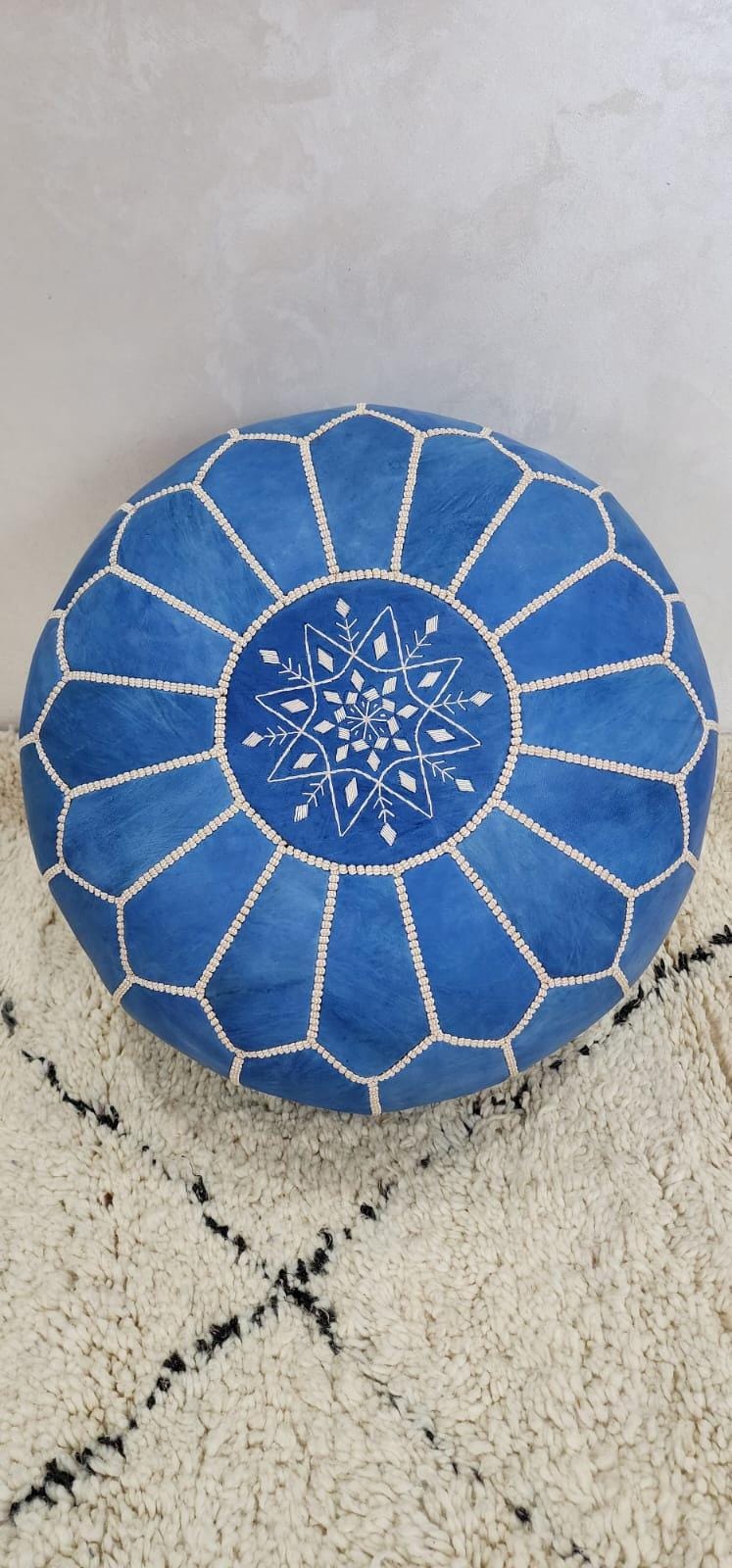 Moroccan Leather Pouf — paired with neutral home decor