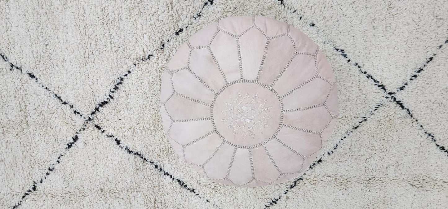 Knit Pouf Ottoman — top view showing weave pattern