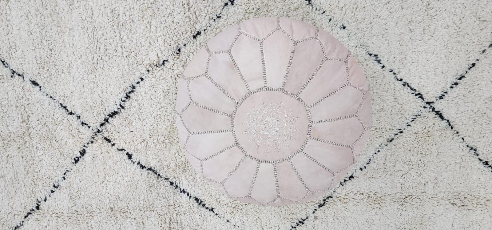 Knit Pouf Ottoman — top view showing weave pattern