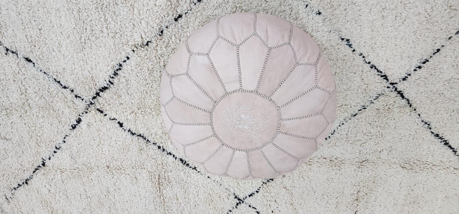 Knit Pouf Ottoman — color variation in natural light