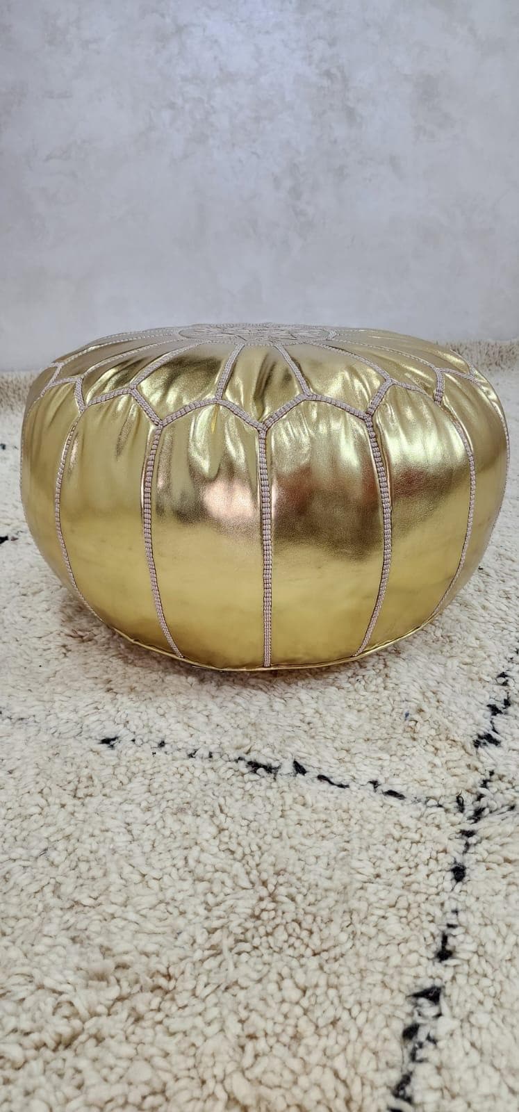 Knit Pouf Ottoman — side view of artisan stitching