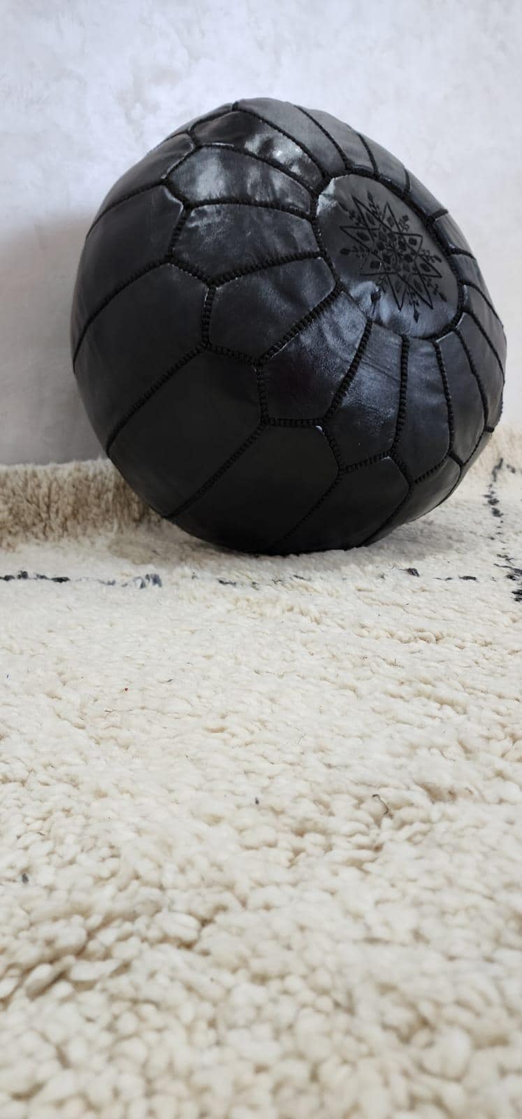 Moroccan Leather Pouf — side view of artisan stitching