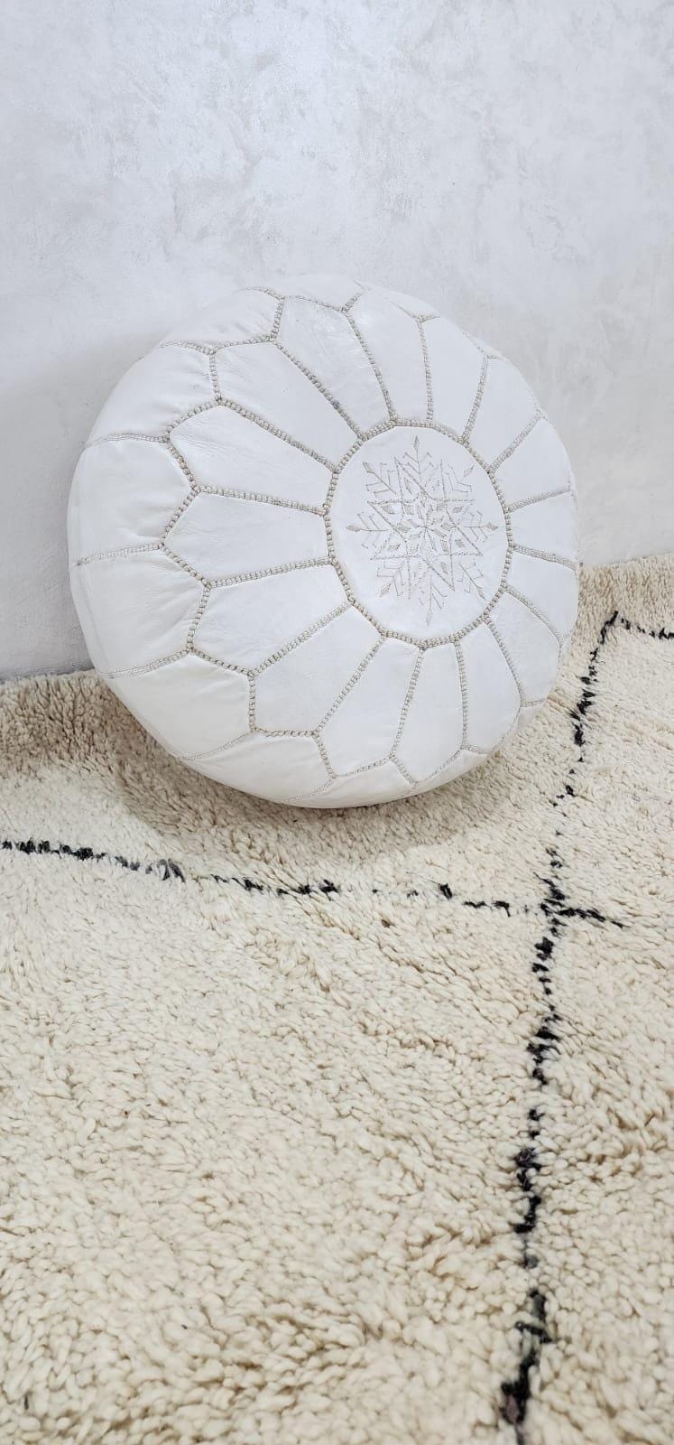 Moroccan Leather Pouf — side view of artisan stitching