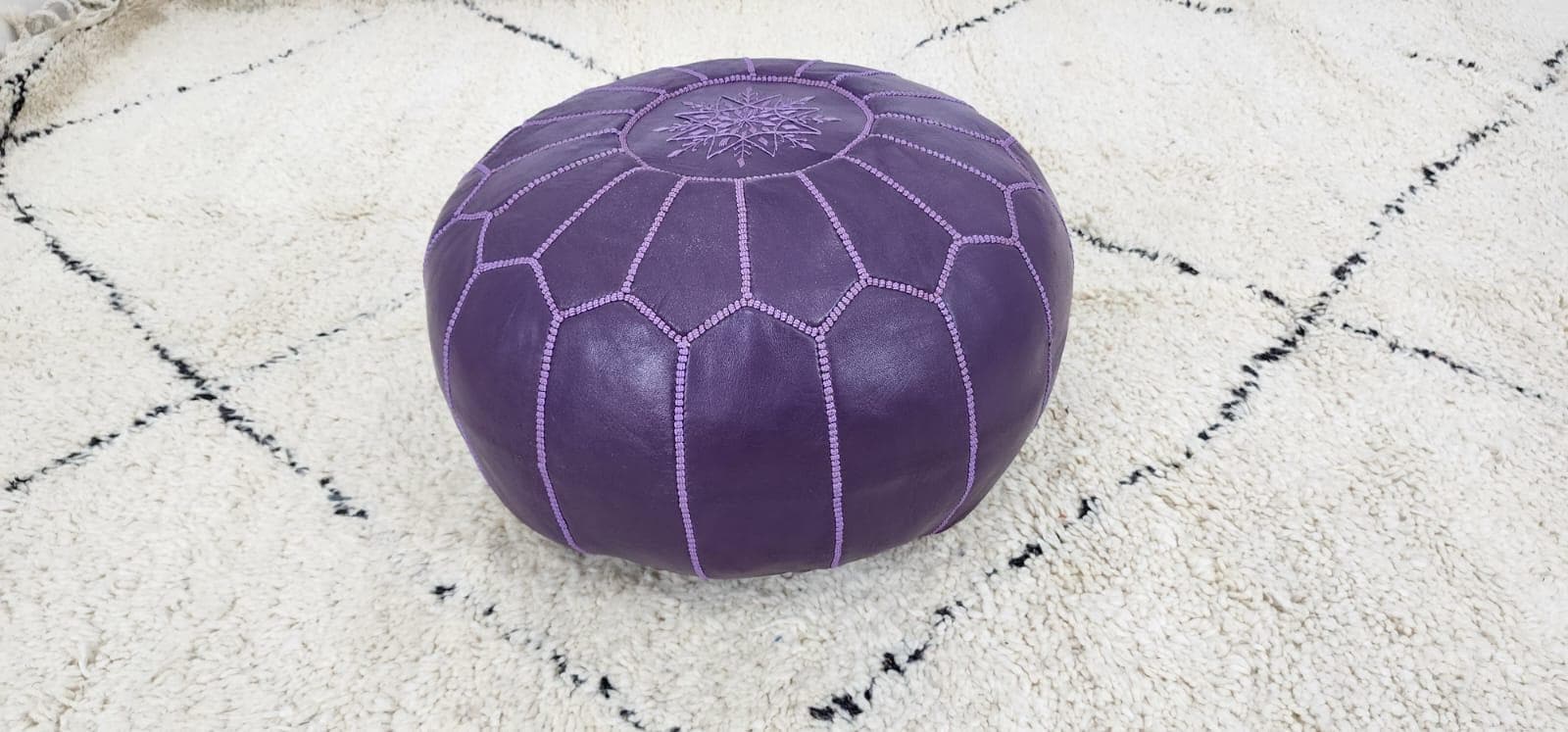 Moroccan Leather Pouf — top view showing weave pattern